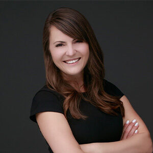 Headshot photo of Jenn Hasselmann.